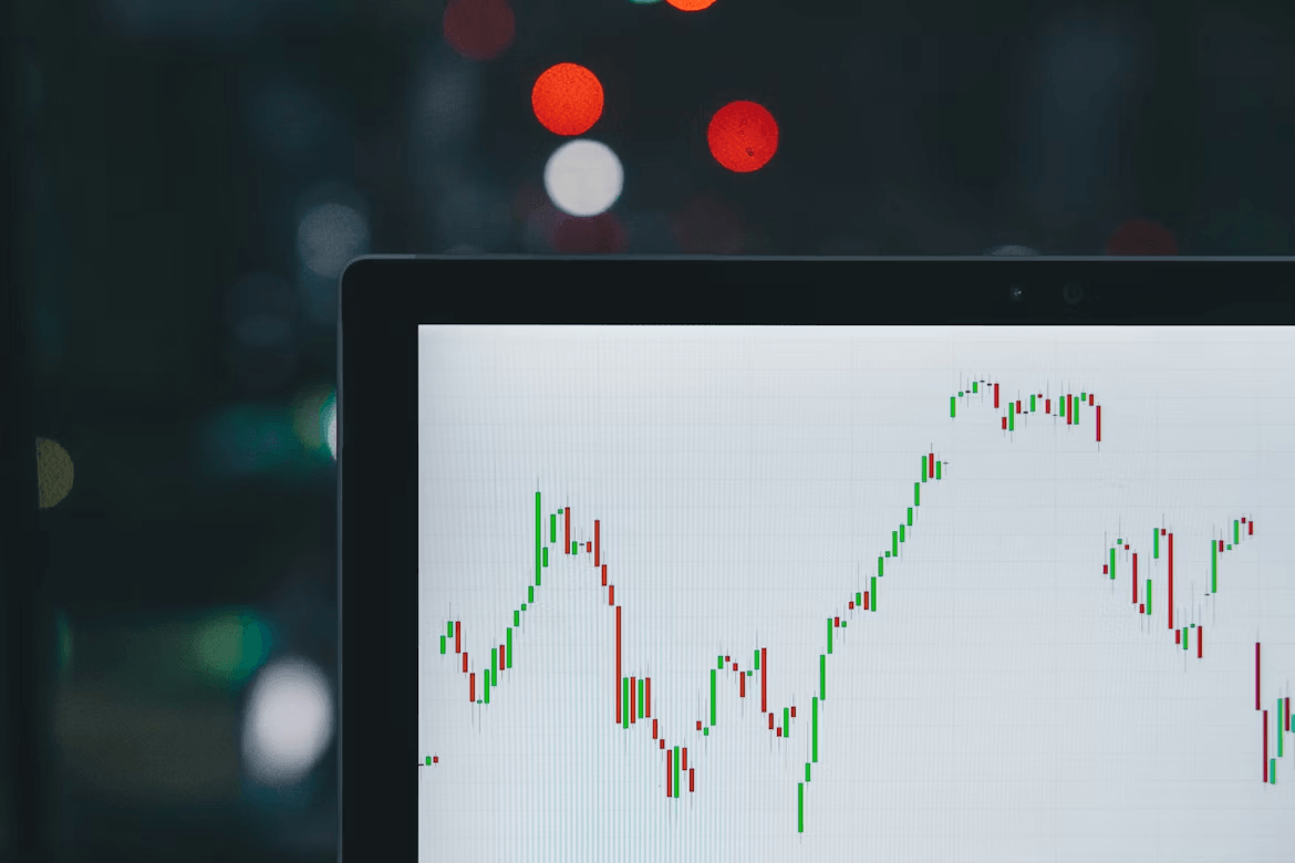 Computer screen display showing crypto stock chart trends for