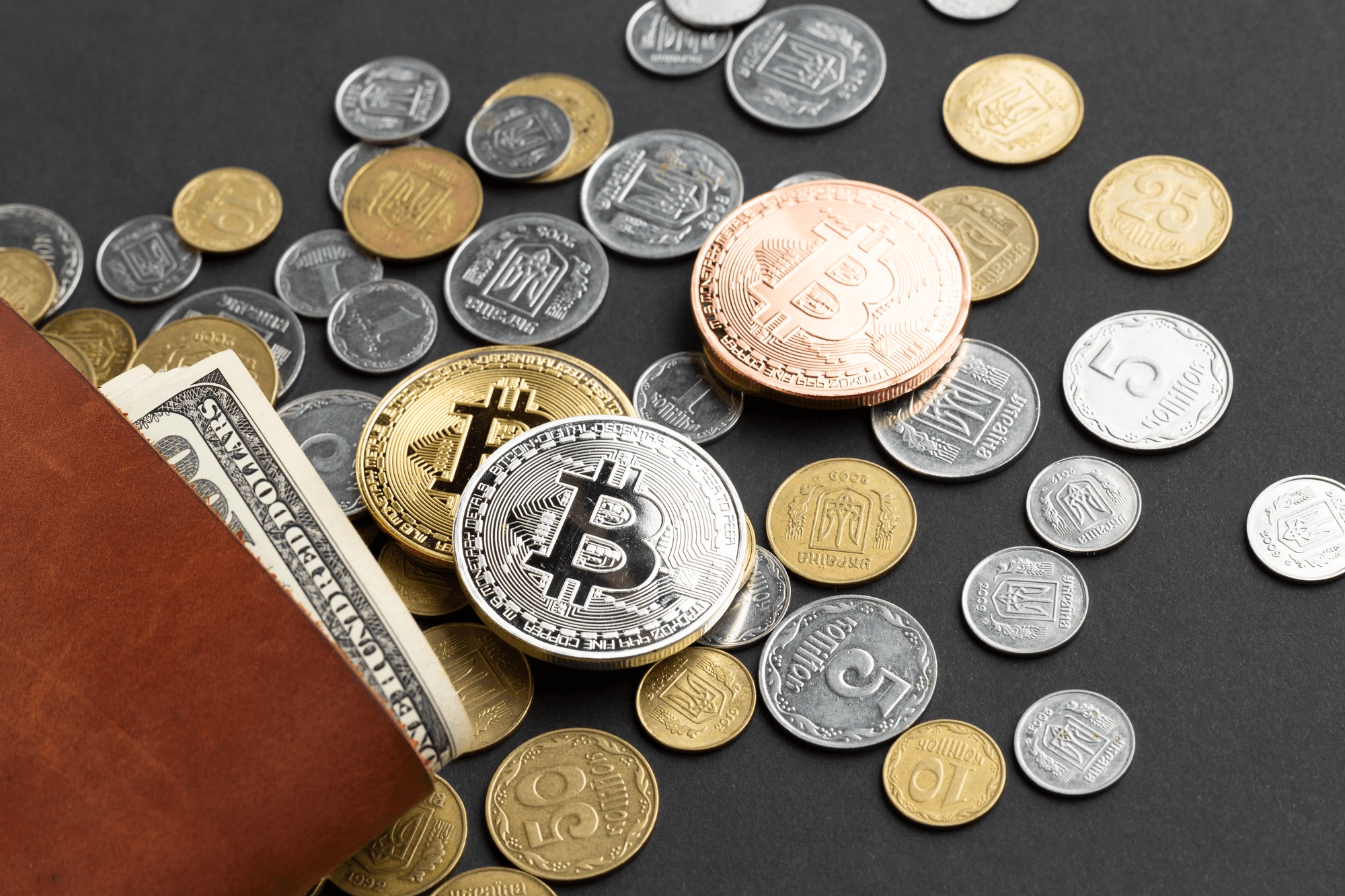 Wallet with Bitcoin crypto coin sticking out